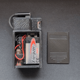 View of inside the battery cover on the backside of the power case